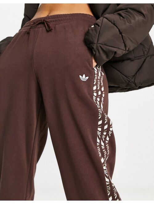 adidas Originals Animal Abstract sweatpants in brown