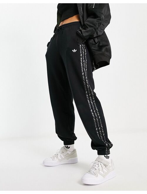 adidas Originals Animal Abstract sweatpants in black