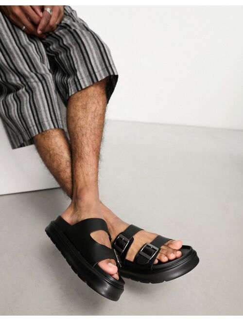 Bershka chunky cross strap sandals in black