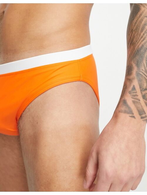 ASOS DESIGN swim briefs with contrast waistband in orange