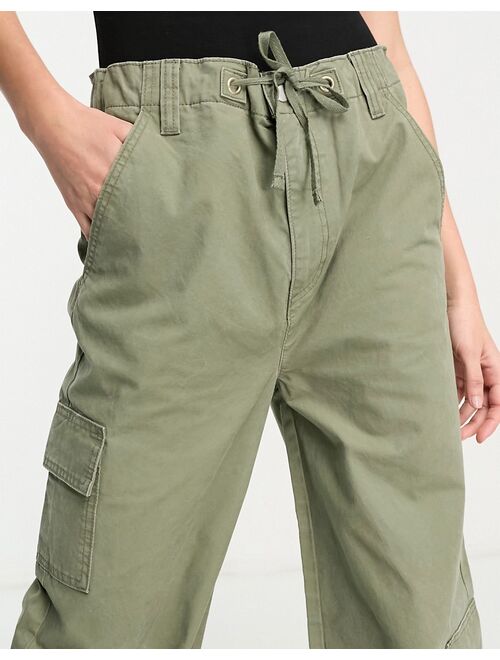 ASOS Tall ASOS DESIGN Tall oversized cargo pants with multi pockets in khaki