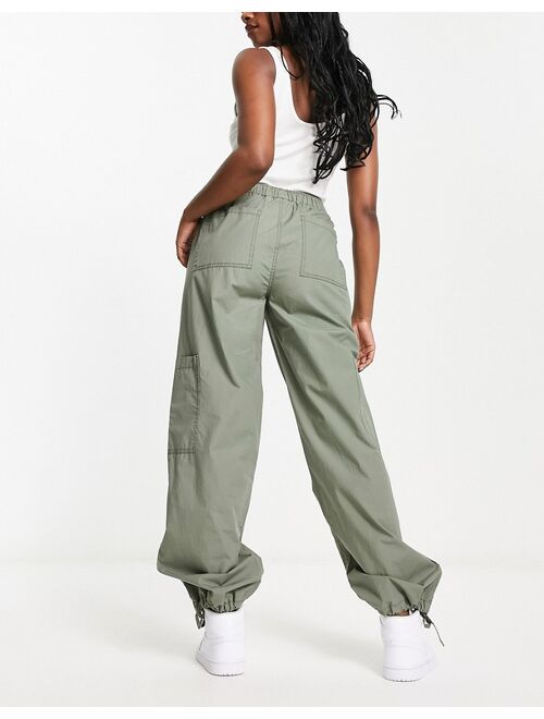 ASOS DESIGN clean pull on cargo pants in Sage