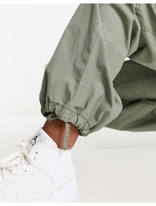 ASOS DESIGN clean pull on cargo pants in Sage