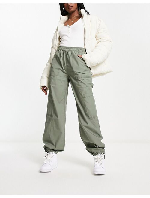 ASOS DESIGN clean pull on cargo pants in Sage