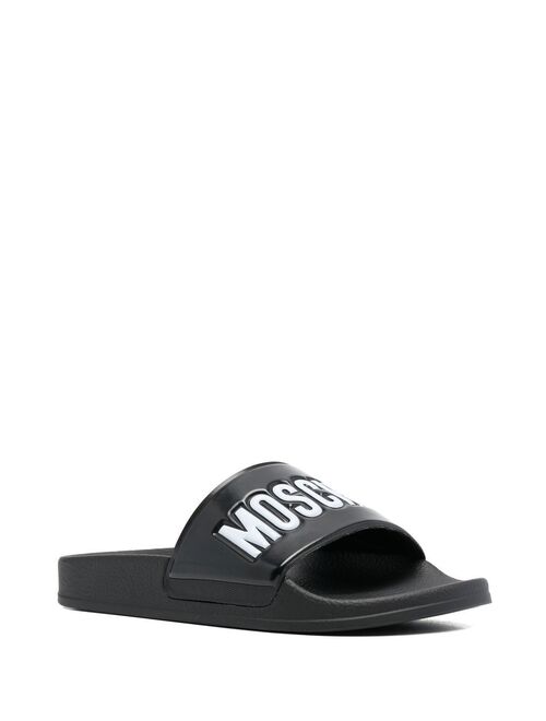 Moschino embossed-logo flat sandals