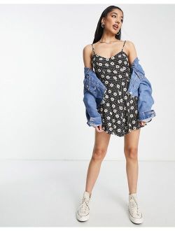 strappy romper in mono heart daisy