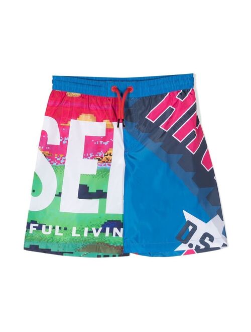 Diesel Kids all-over logo print shorts