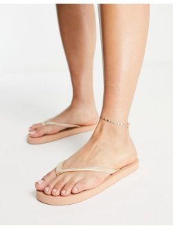 Filter flip flops in cream