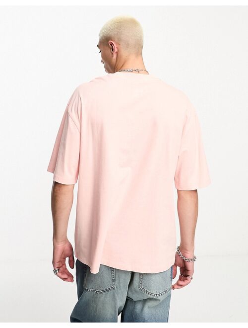 COLLUSION Unisex photographic front print t-shirt in pink