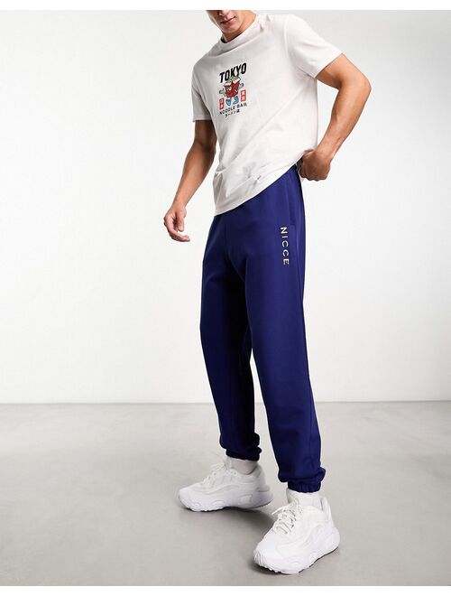 Nicce split logo jersey sweatpants in navy