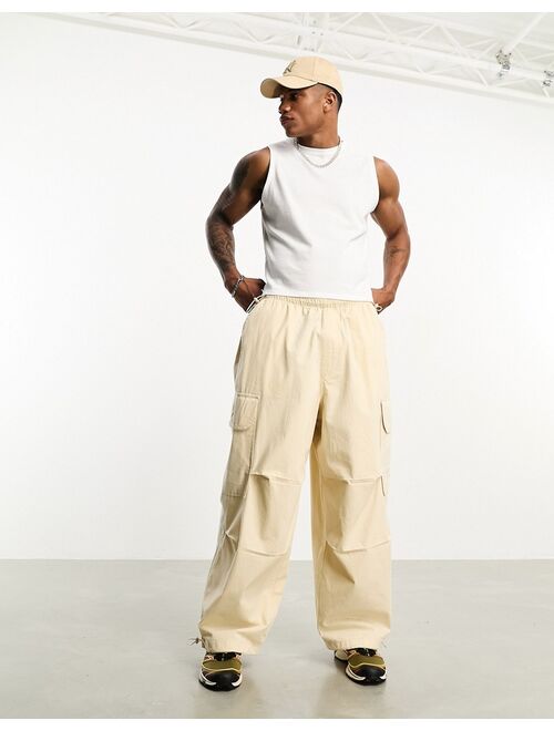 ASOS DESIGN parachute cargo pants in beige rip stop