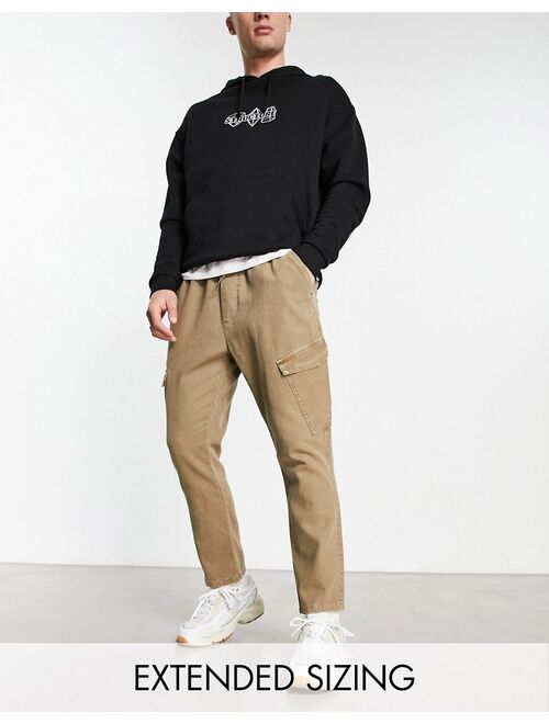 ASOS DESIGN tapered cargo pants in washed brown