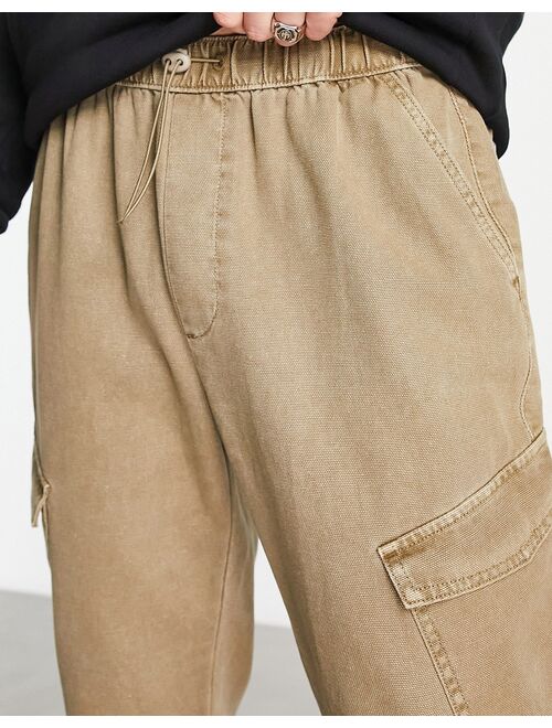 ASOS DESIGN tapered cargo pants in washed brown