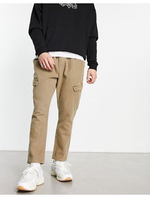 ASOS DESIGN tapered cargo pants in washed brown