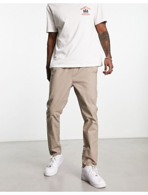 ASOS DESIGN skinny chino pants in light brown