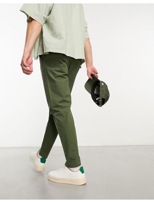 ASOS DESIGN classic rigid lightweight chinos in olive green