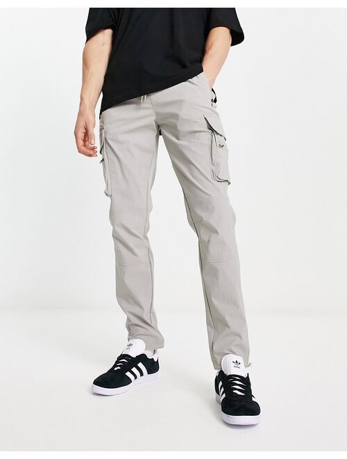 ADPT technical cargo pants in gray