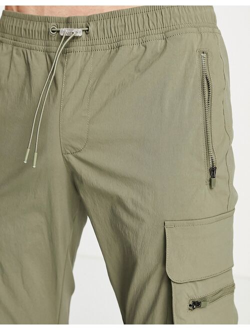 ADPT technical cargo pants in khaki