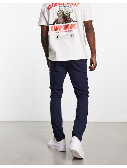 ASOS DESIGN skinny chinos in navy