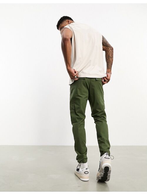 ASOS DESIGN tapered lightweight cargo pants in olive green