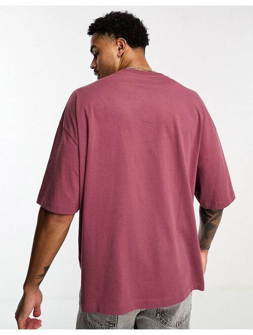 ASOS DESIGN oversized t-shirt in raspberry with chest souvenir print