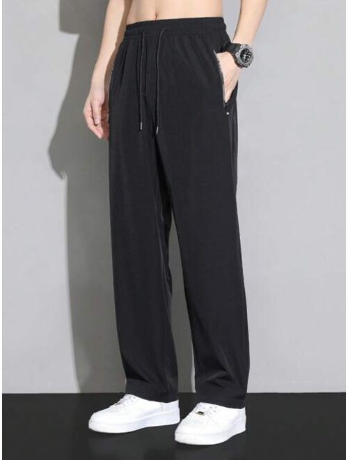 Men Drawstring Waist Slant Pocket Pants