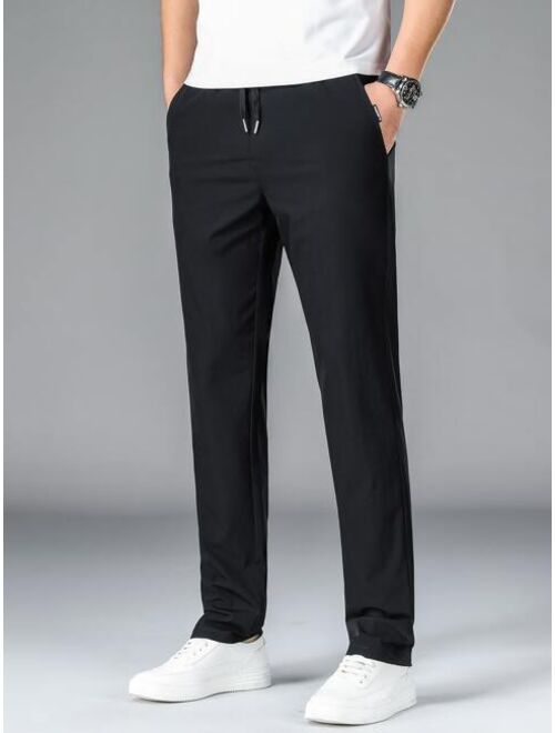 Men Drawstring Waist Slant Pocket Pants