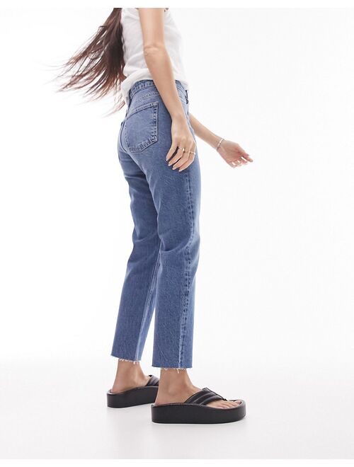 Topshop mid rise straight jeans with raw hem in mid blue