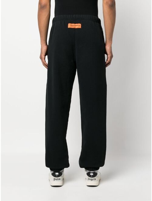 Heron Preston flame-print cotton track pants