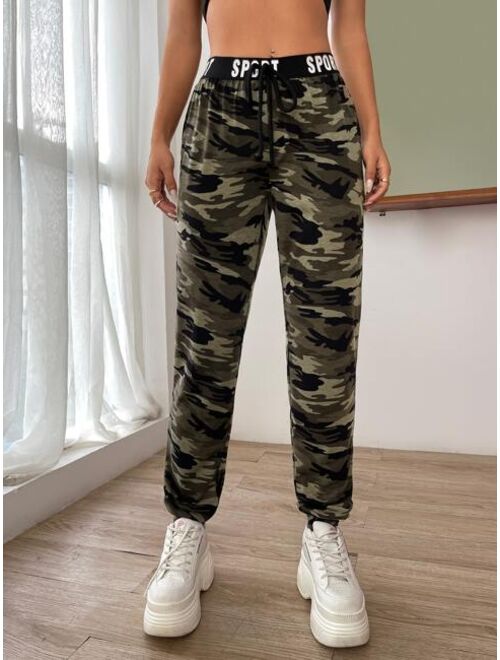 SHEIN EZwear Camo Print Knot Front Letter Tape Sweatpants