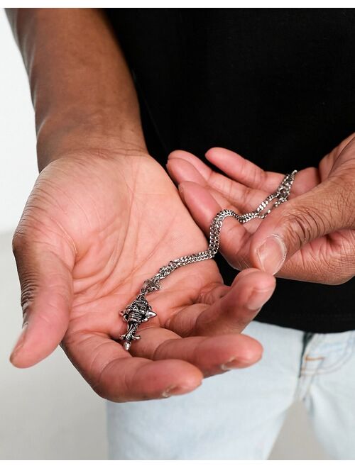 ASOS DESIGN waterproof stainless steel necklace with skull and snake cross pendant in burnished silver tone