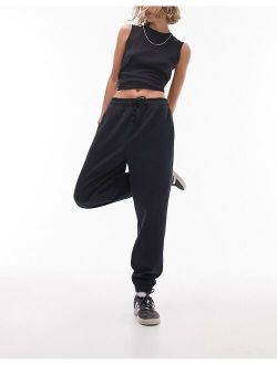 Petite oversized cuff sweatpants in washed black