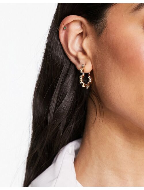 DesignB London molten metal hoop earrings in gold