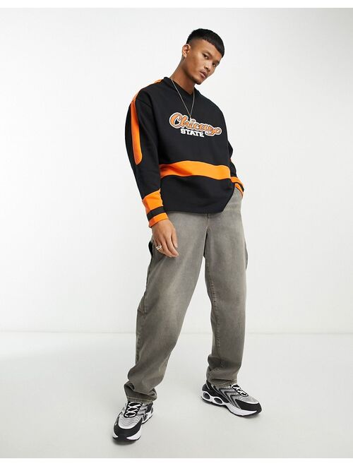 ASOS DESIGN oversized hockey jersey with city print in black and orange