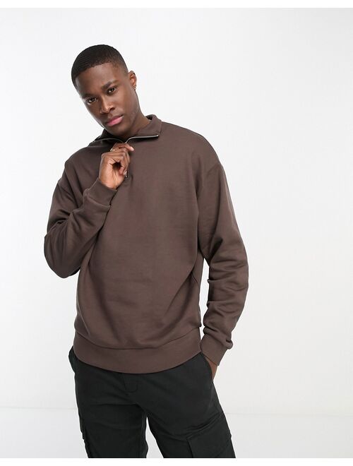 ASOS DESIGN oversized half zip sweatshirt in brown