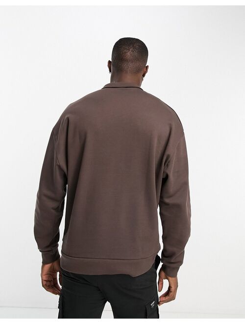 ASOS DESIGN oversized half zip sweatshirt in brown