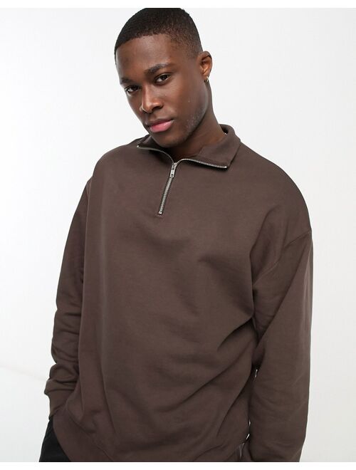 ASOS DESIGN oversized half zip sweatshirt in brown