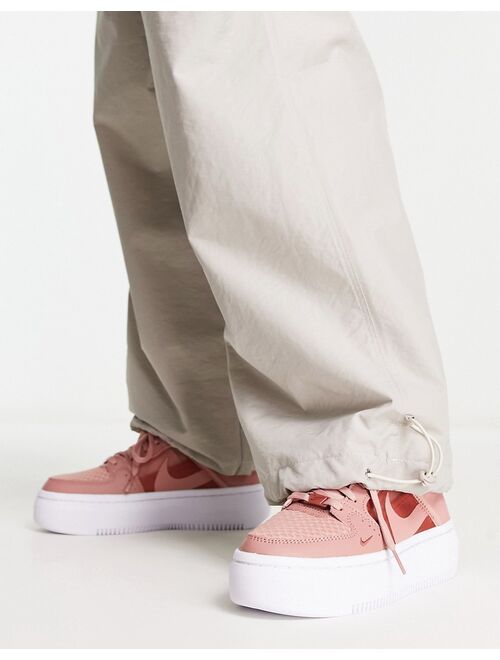 Nike Court Vision Alta platform sneakers in rust pink