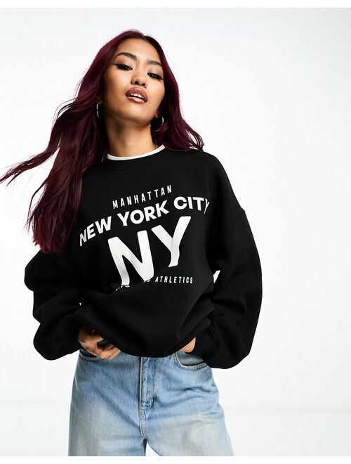 Bershka 'NYC' oversized sweatshirt in black