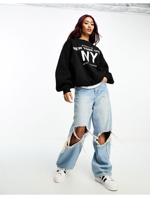 Bershka 'NYC' oversized sweatshirt in black