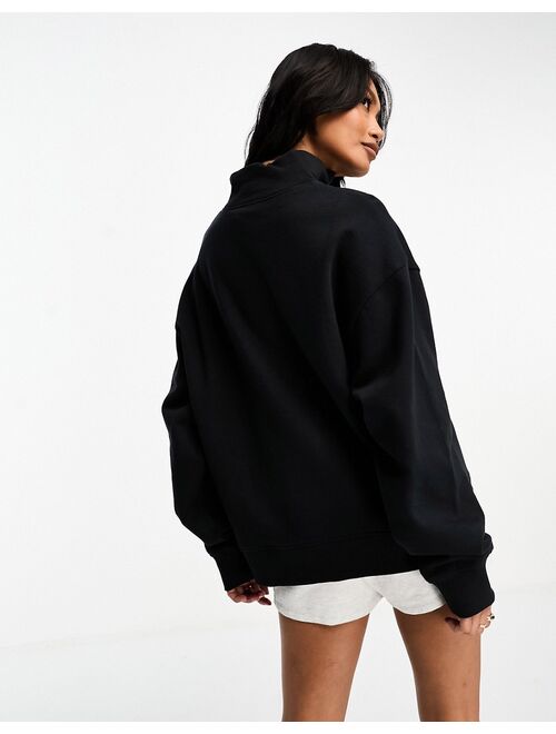 ASOS DESIGN half zip sweatshirt in black