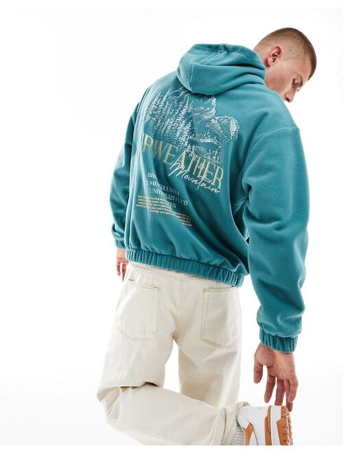 ASOS DESIGN oversized hoodie with back print in teal fleece