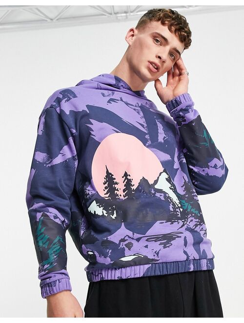 ASOS DESIGN oversized hoodie in purple with all over mountain print