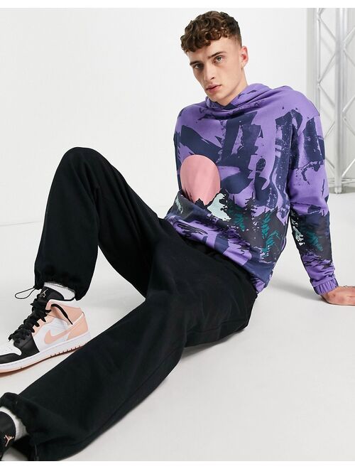 ASOS DESIGN oversized hoodie in purple with all over mountain print