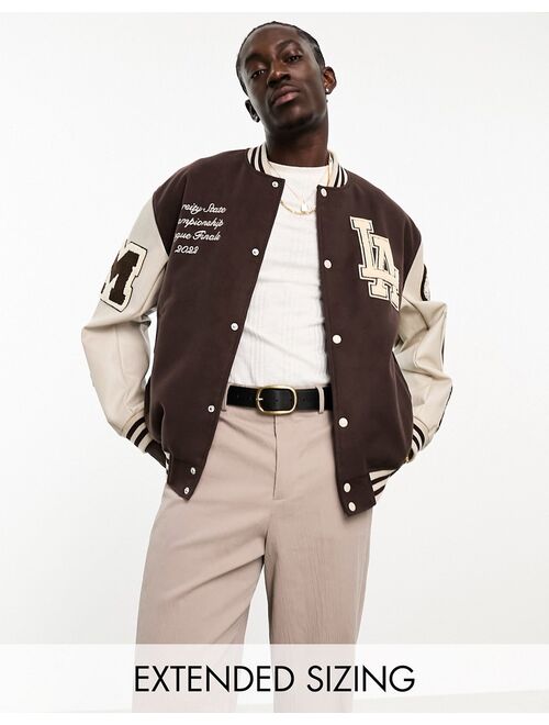 ASOS DESIGN oversized varsity bomber jacket in brown