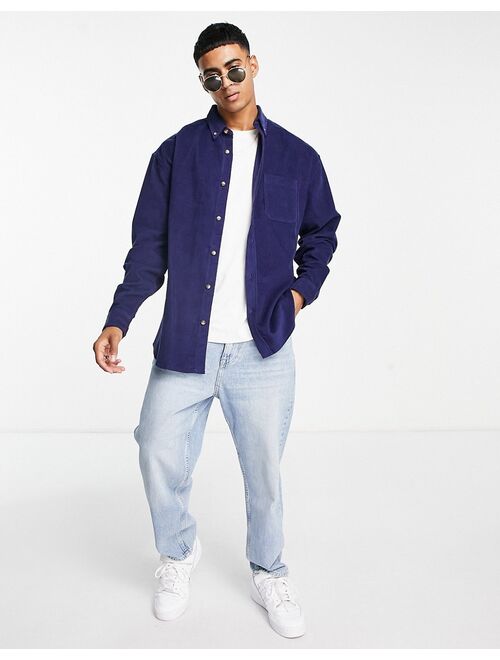 ASOS DESIGN 90s oversized cord shirt in navy