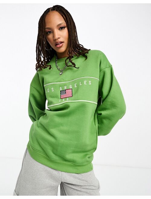 Daisy Street relaxed sweatshirt with LA graphic in pistachio