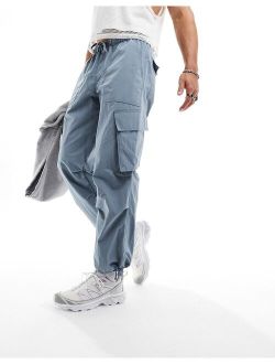 oversized parachute crinkle cargo pants in blue