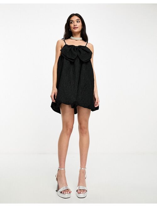 Sister Jane puffball bow jacquard mini dress in black