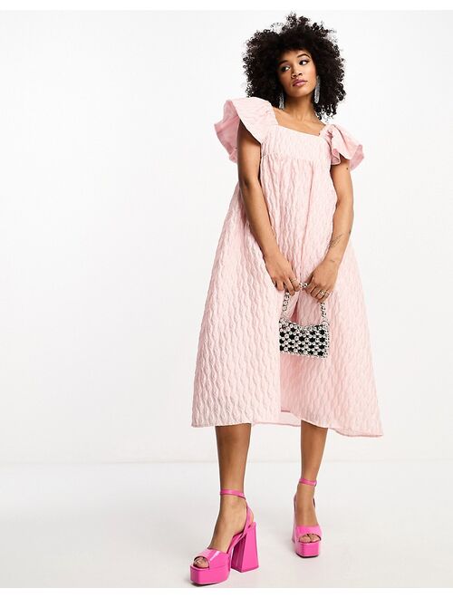 Sister Jane puff sleeve jacquard midi dress in powder pink